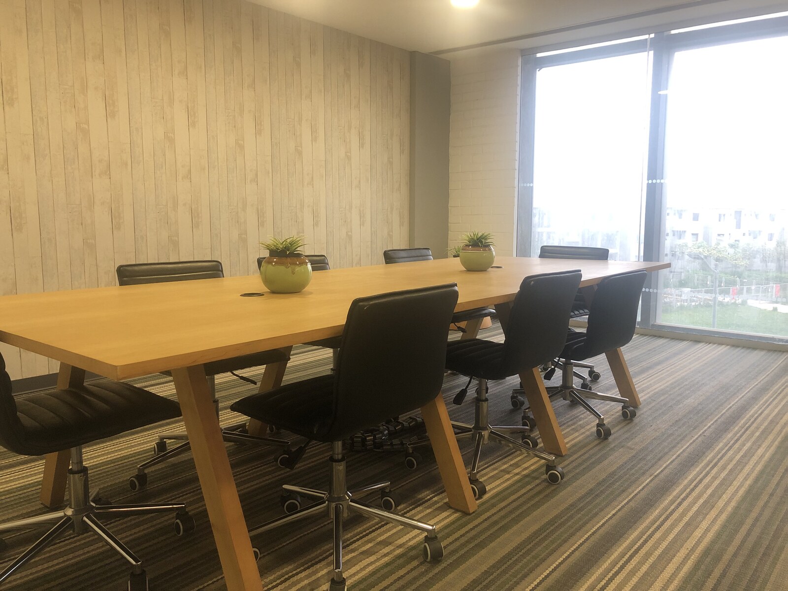Cospaze Nikoo Homes — meeting room with garden view